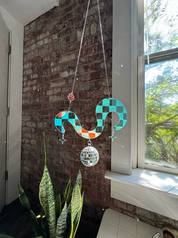 Disco Dreams Suncatcher - iridescent acrylic with engraved disco ball and checker pattern