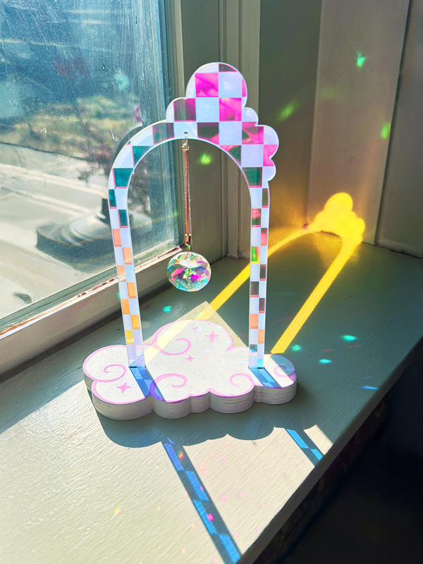 Dream Portal Tabletop Suncatcher - iridescent acrylic with crystal prisms on painted wood cloud base