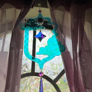 Customer photo of suncatcher hanging in window